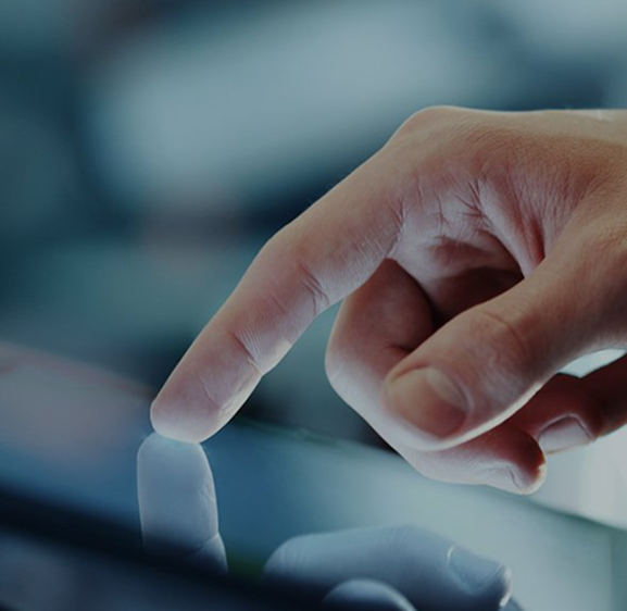 A finger touching a digital screen, symbolising easy access to businesses via an Asian directory.